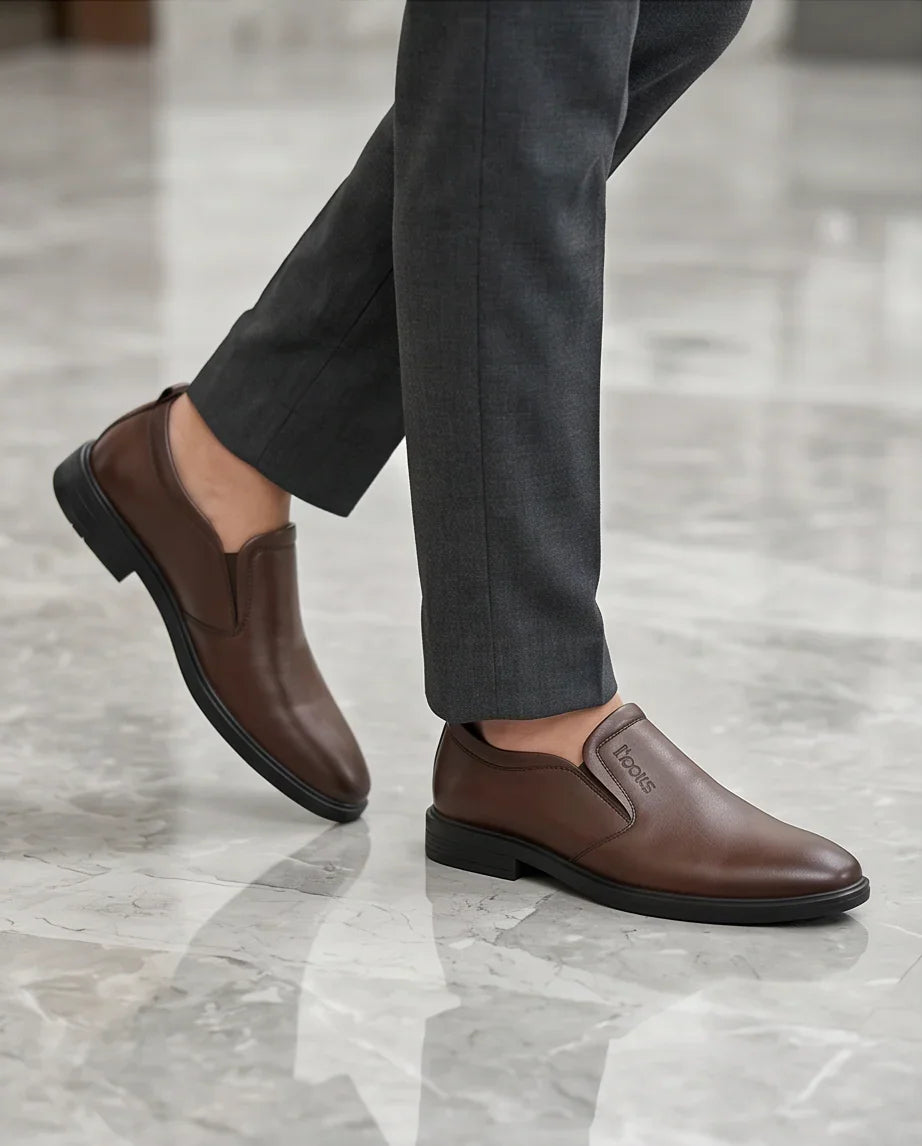 Brown leather slip-on shoes for men, stylish & comfortable for casual or office wear, perfect for everyday use.