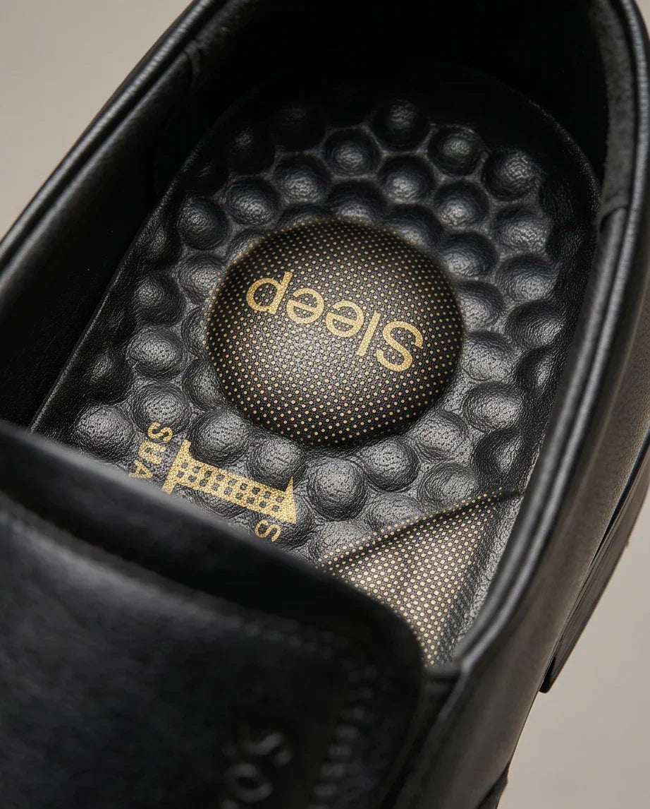 Premium black sneaker with 'Sleep' branded insole for comfort and style