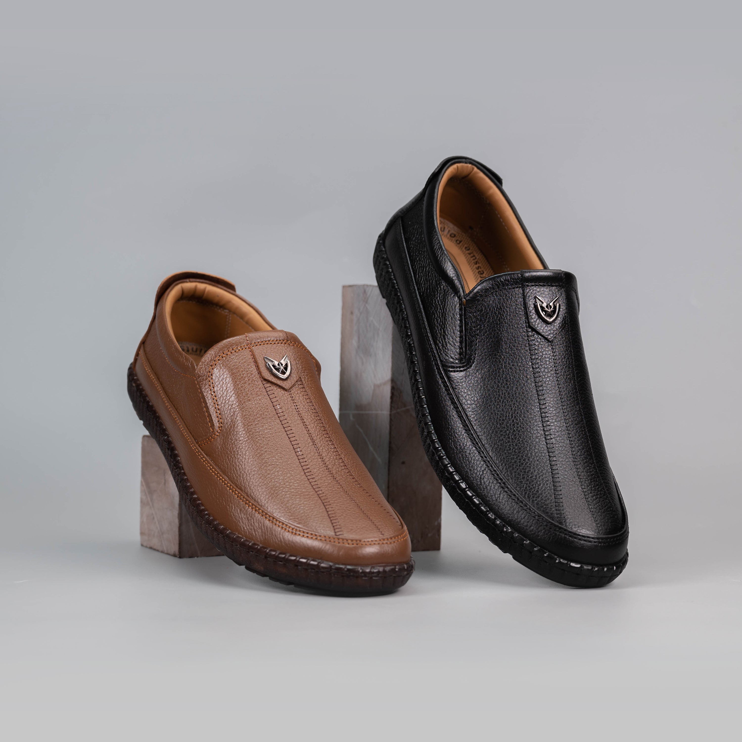 Clarks Men's Shoe 1102 in black & Brown leather with a sleek design, perfect for formal and casual wear (ShoeInn.co, Pakistan)