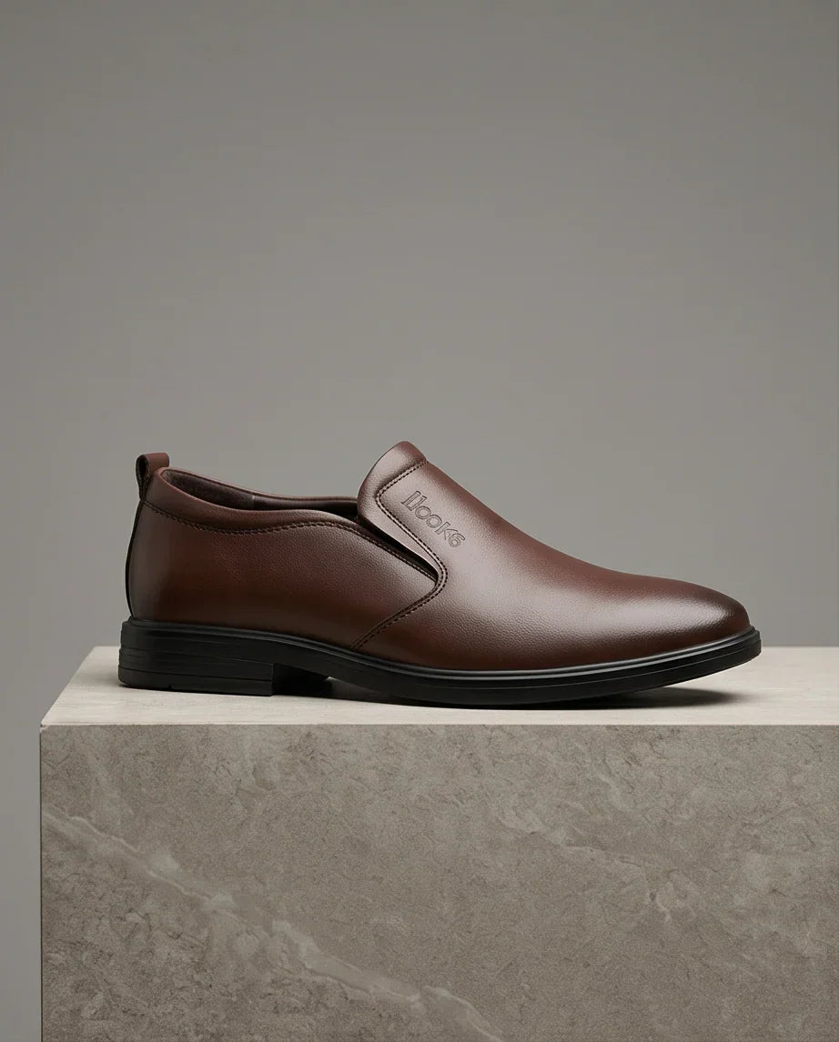 Brown leather slip-on shoe with 'Looks' branding, stylish & comfortable for everyday wear