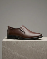 Brown leather slip-on shoe with 'Looks' branding, stylish & comfortable for everyday wear