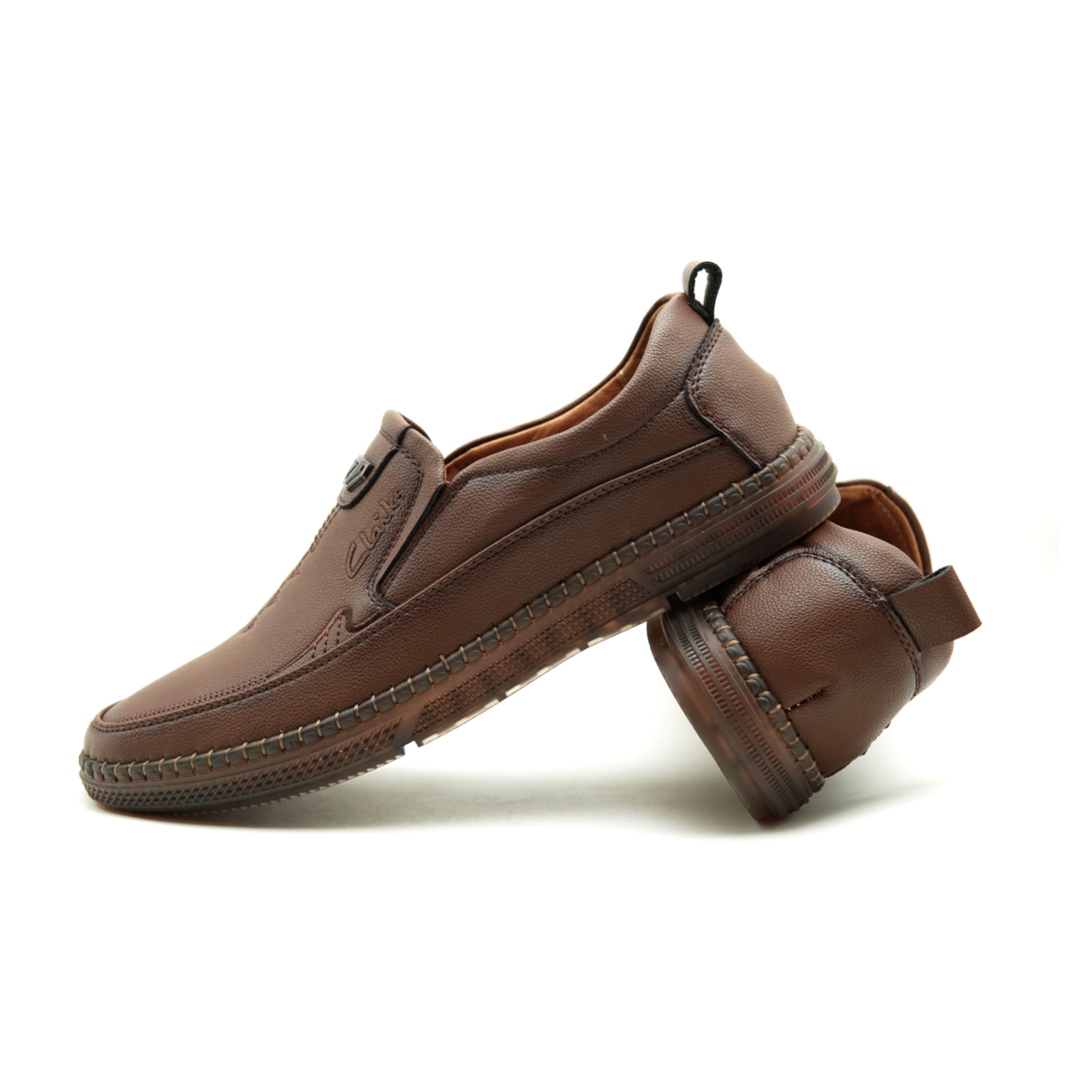 Clarks 109-7 Men's Brown Shoes crafted with imported artificial leather and a jelly sole, designed for maximum comfort and style.