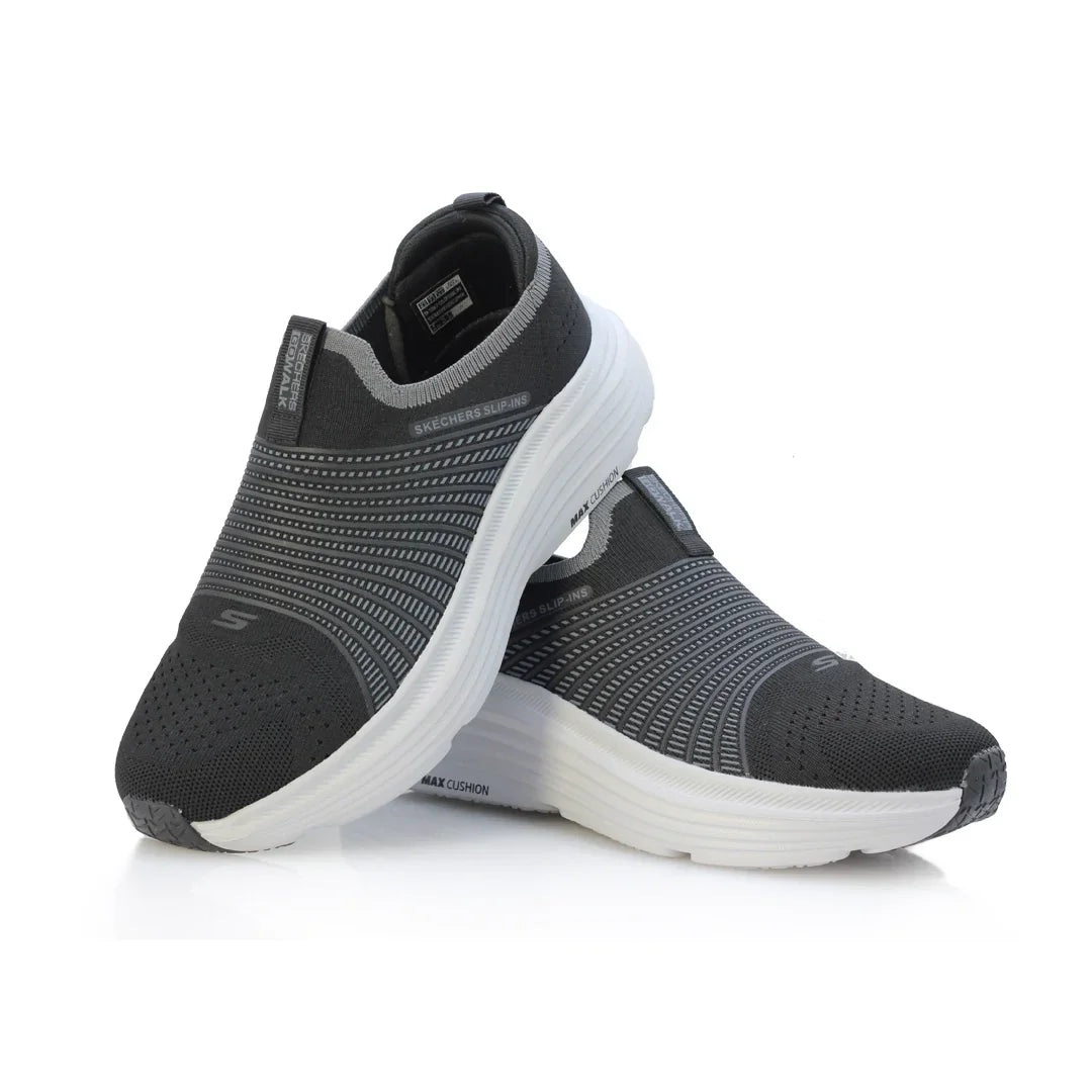 Stylish black Skechers slip-ons with max cushion comfort for everyday wear