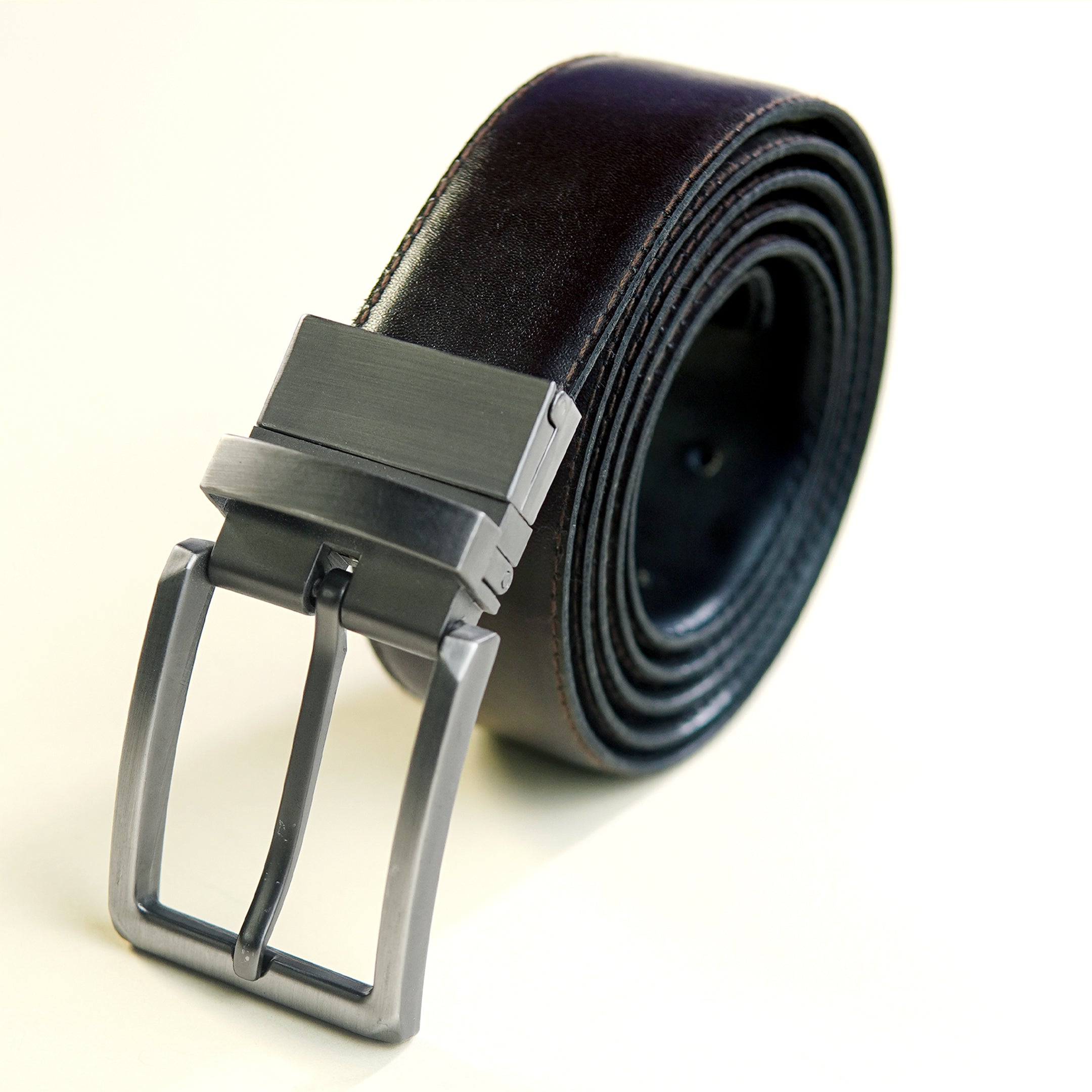 Rolled view of the Shoeinn cow leather belt highlighting thickness and quality