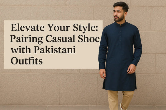Stylish man in navy kurta & beige pants pairing casual shoes with Pakistani outfits for elevated style