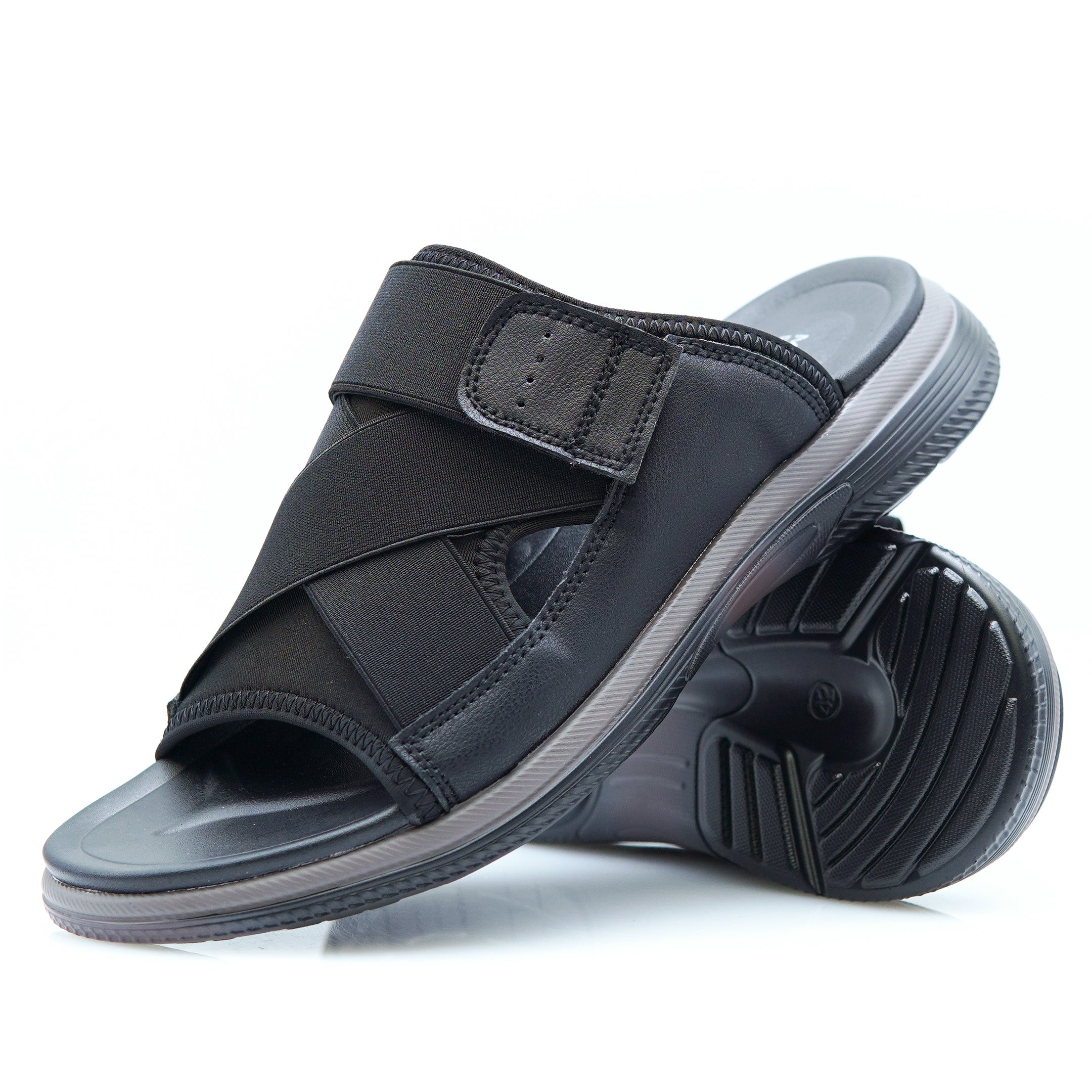 Elegant black Slippers  with sleek design and cushioned footbed, perfect for everyday wear.